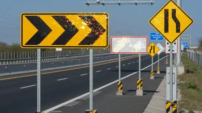 Traffic signs with reflective faces